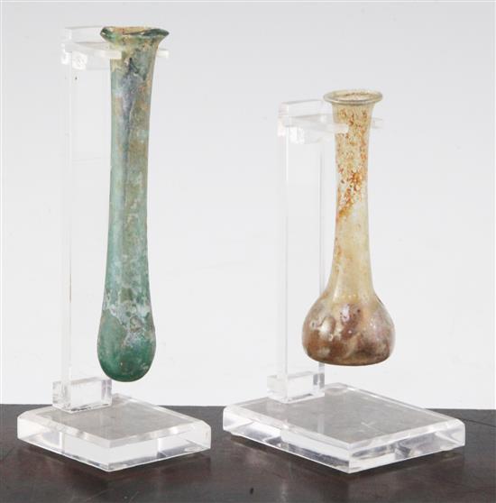 Two Roman glass unguentarium, c.2nd century A.D., 12.5 and 9.5cm